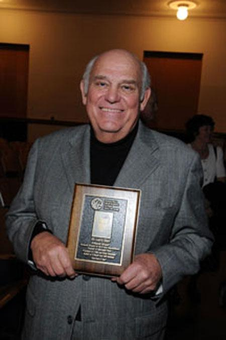 Larry with Hall of Fame Plaque