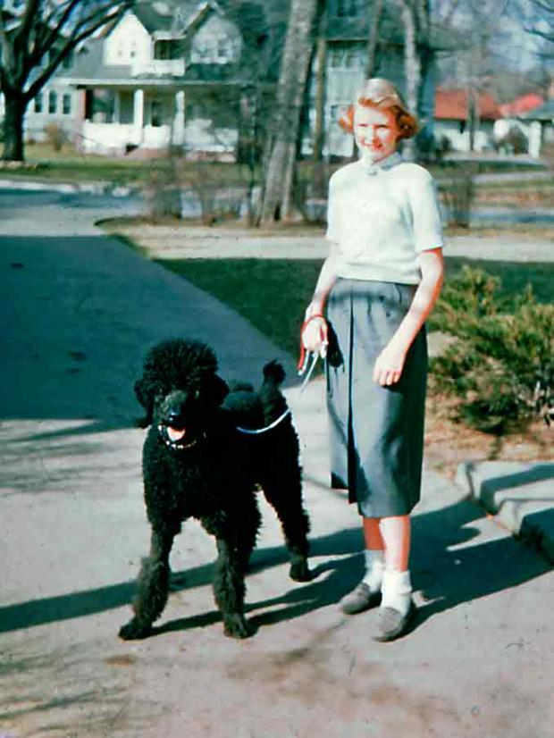 Suhler's poodle Baron and Sue Suhler 1956 at home